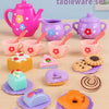 A colorful 27-piece pretend play tea party set featuring pink and purple ceramic teaware, including a teapot, cups, and food 