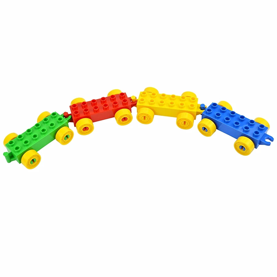 A set of large building blocks shaped like a traffic vehicle in red, yellow, and blue colors.