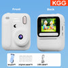 Front and back views of a white instant print camera with accessories like a lanyard, paper, and USB cable.