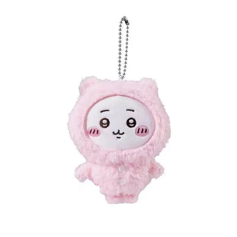 A pink Usagi Hachiware plush keychain with a white face design and a silver chain.