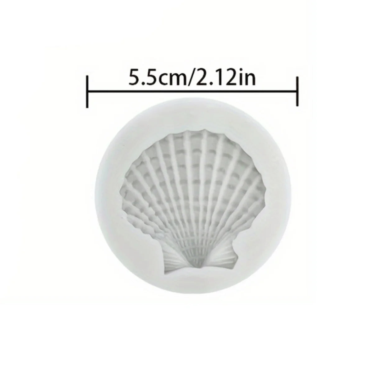 A white silicone baking mold shaped like a seashell, measuring 5.5cm or 2.12in.