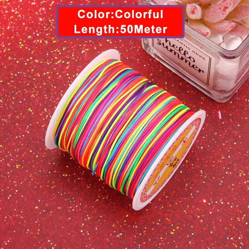 A spool of colorful nylon knotting cord for jewelry making with a label indicating 50 meters.