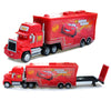 A red diecast toy hauler truck featuring Lightning McQueen and a lightning bolt design.