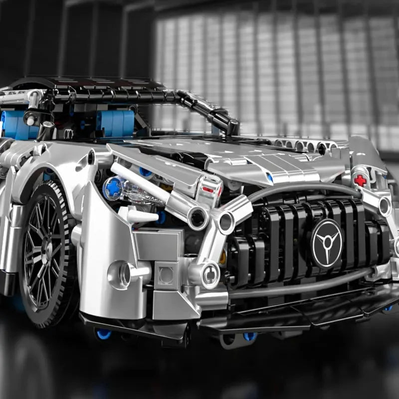 A detailed model kit of a silver and black sports car racing vehicle built from building blocks.