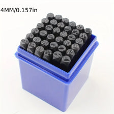 A small blue container filled with 36 black carbon steel stamping pins for marking leather, metal, and wood.