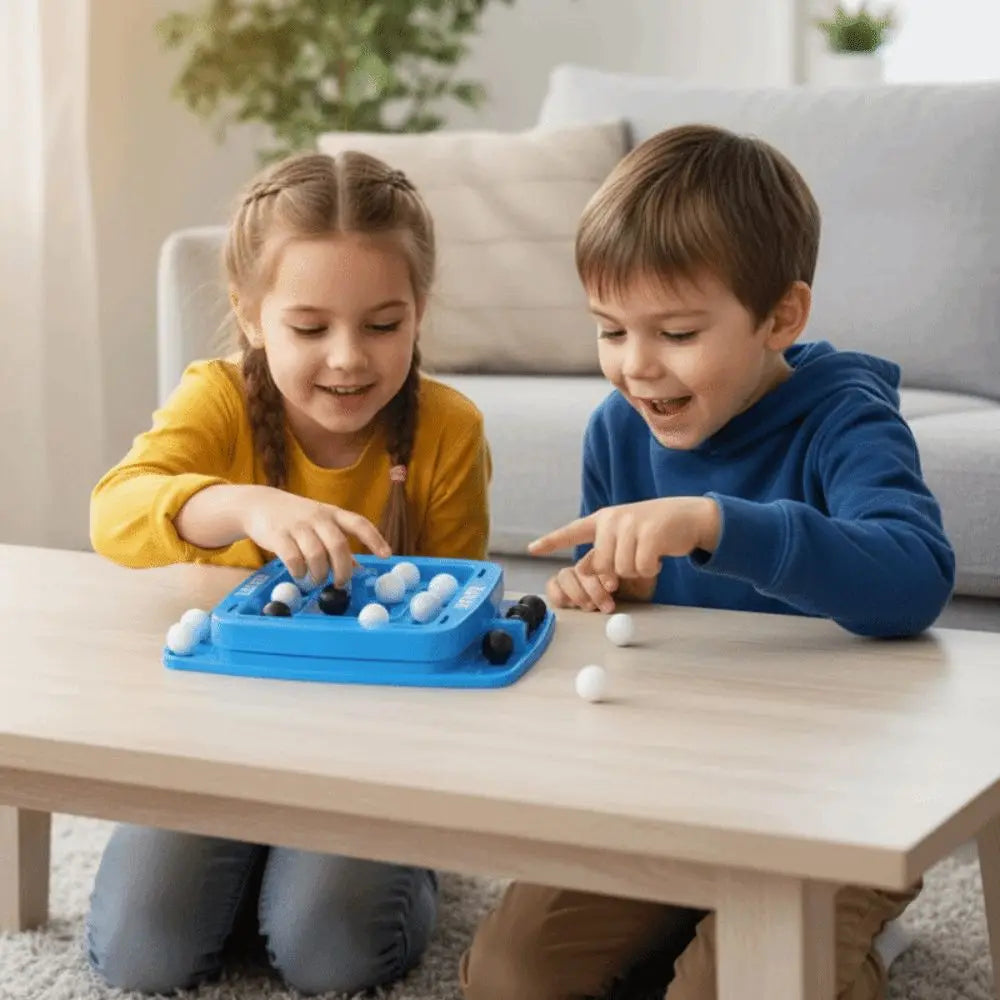 Two children play a blue strategy board game with white and black pieces on a wooden table.