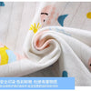 White cotton pajama fabric with pastel floral print rolled up, showing a soft texture.