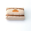 A beige roof bag and bedroll decoration set for a 1/18 or 1/24 RC crawler.