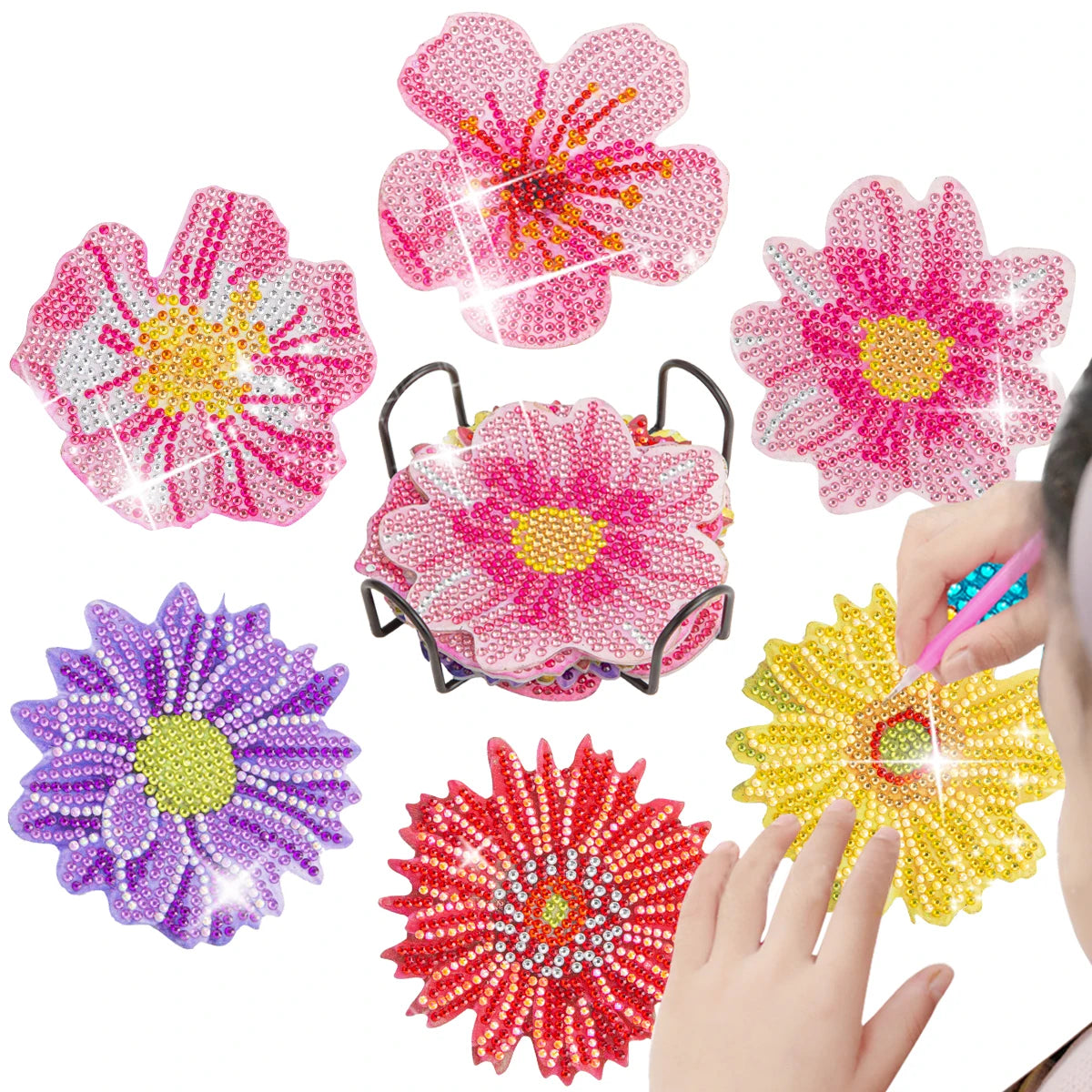 A set of five 3D mandala flower coasters made from pink, purple, and yellow sequins and rhinestones.