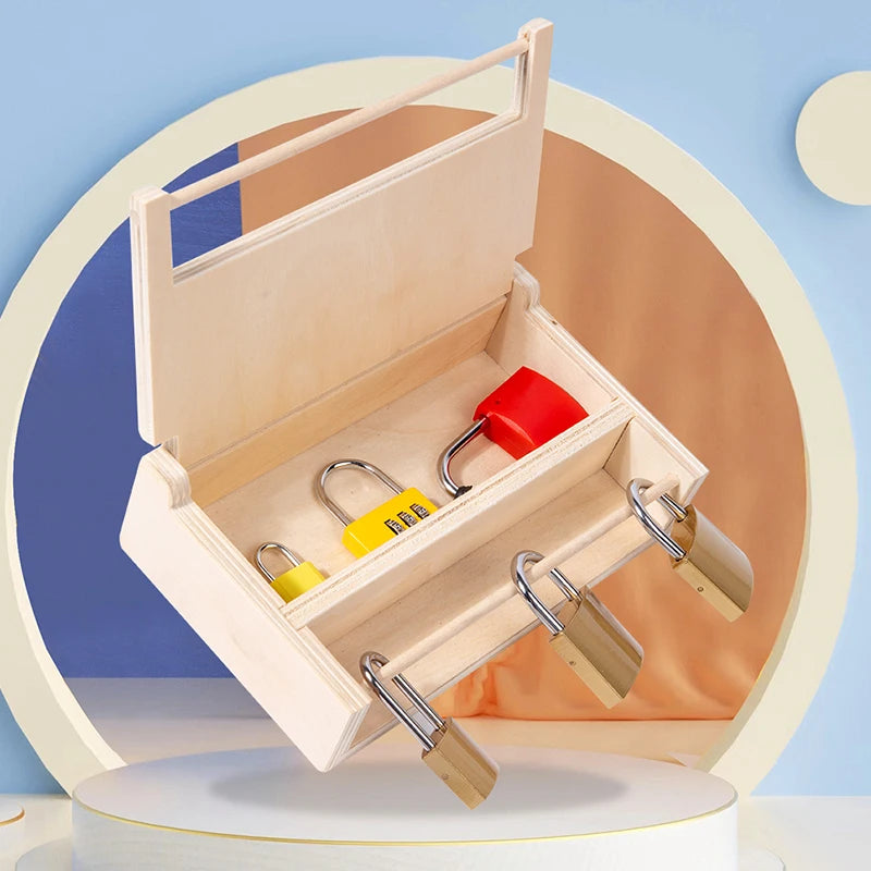 A wooden lock and key toy set with a light wood box, yellow and red locks, and a red key inside.