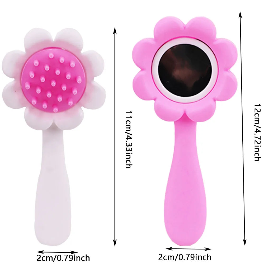 A pink doll feeding and care accessory set featuring a flower-shaped brush and a pink feeding tool.