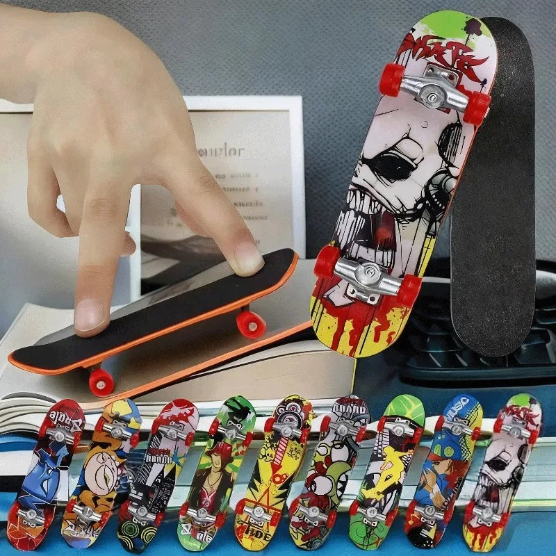 A hand holds a mini finger skateboard with various colorful designs and wheels.