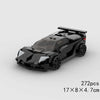 A black classic rally car building block model kit with detailed features.