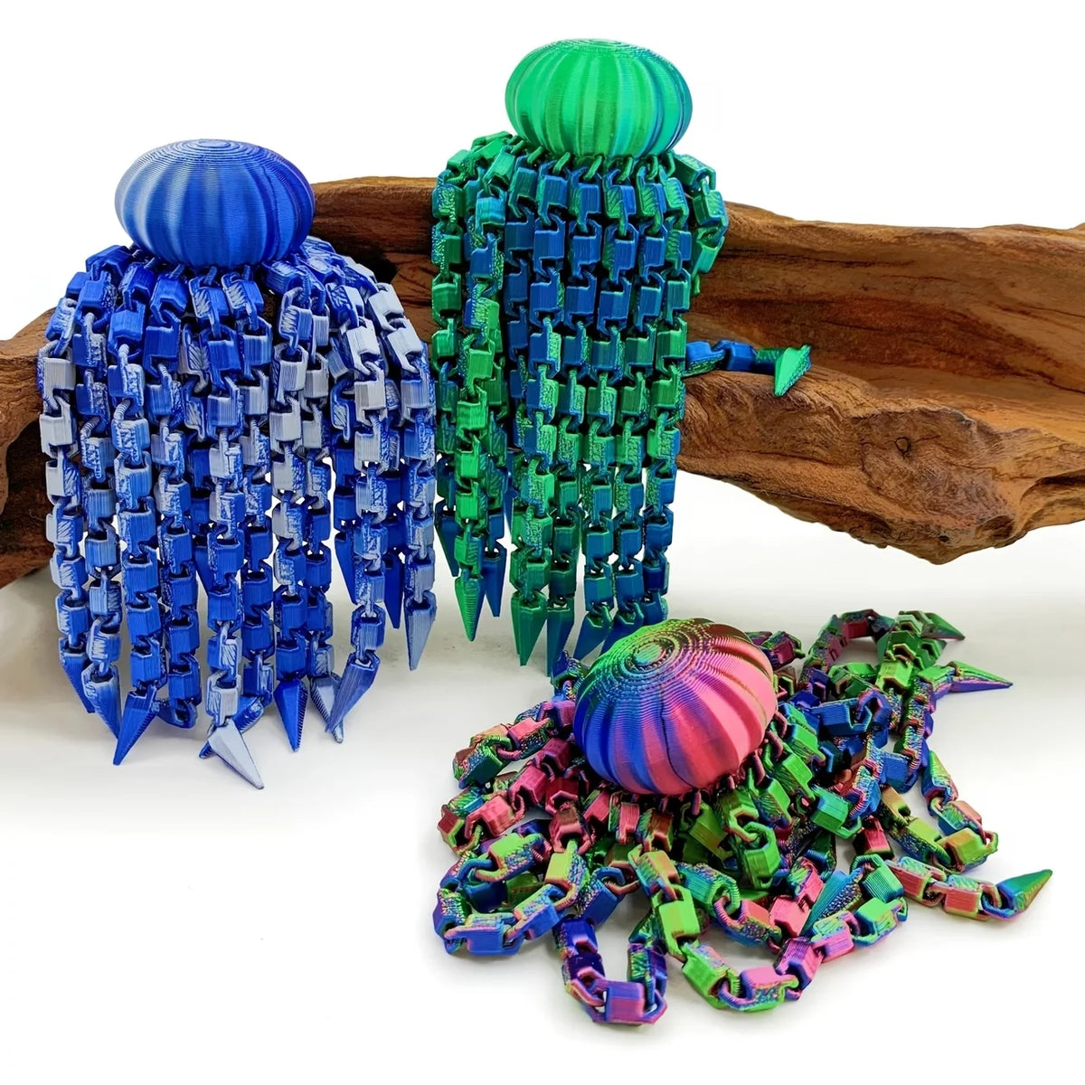 Colorful octopus desktop statue with blue and green tentacles resting on a wooden surface.