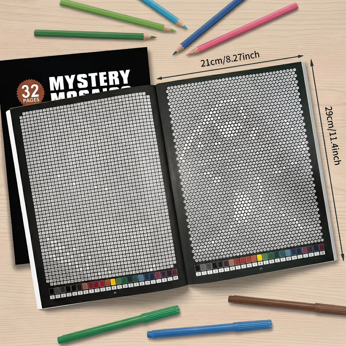 A book of 32 mystery mosaics color by number pixel art pages with colored pencils and paintbrushes.