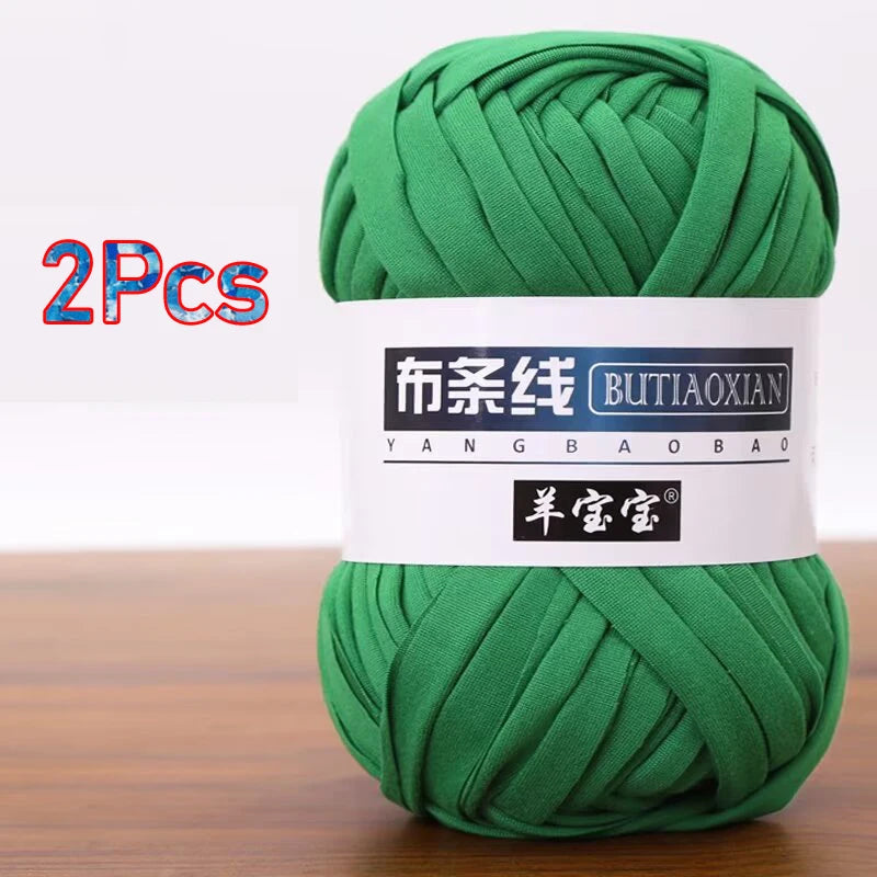 Two skeins of green soft chunky t-shirt yarn for crochet and knitting