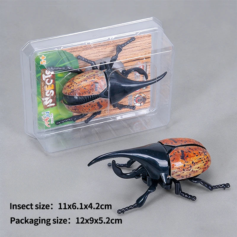 A wind-up insect toy set featuring a ladybug, bee, and beetle inside clear plastic packaging.