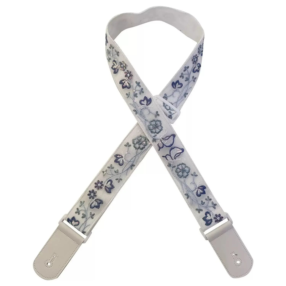A beige woven guitar strap with blue floral patterns and leather accents.