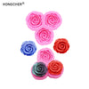 A set of pink and blue silicone molds shaped like roses and peonies for resin, jewelry, and baking.