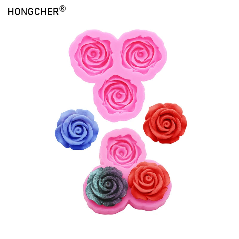 A set of pink and blue silicone molds shaped like roses and peonies for resin, jewelry, and baking.