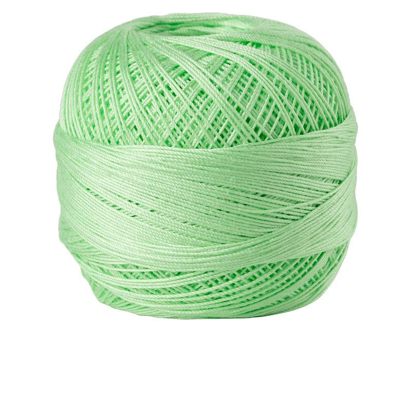 A ball of bright lime green 100% cotton crochet thread for tatting and embroidery.