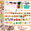 A large assortment of 92 plastic pretend play kitchen items including fruits, vegetables, and cookware for kids