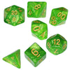 A set of seven green marble effect polyhedral dice showing various numbers and shapes.