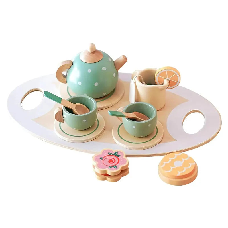 A wooden pretend play kitchen set featuring a green teapot, cup, and various tea accessories on a light wooden plate.