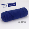 A skein of navy blue denim yarn labeled as item 11, ready for knitting or crochet projects.