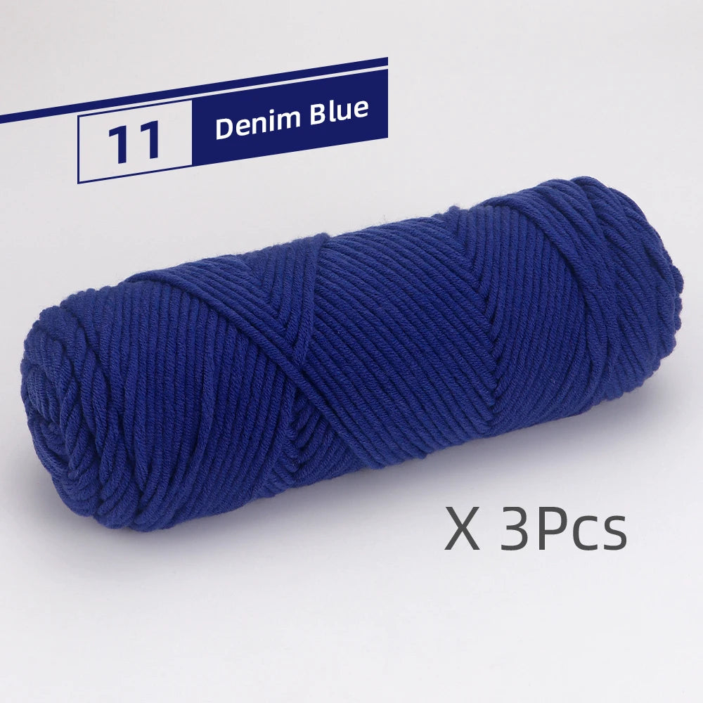 A skein of navy blue denim yarn labeled as item 11, ready for knitting or crochet projects.