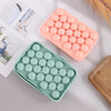 Pink and mint silicone molds for grape clusters used in soap and candle making