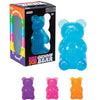 Eine Box mit Gummibären-Sensorikwürfeln in lila, blau und orange