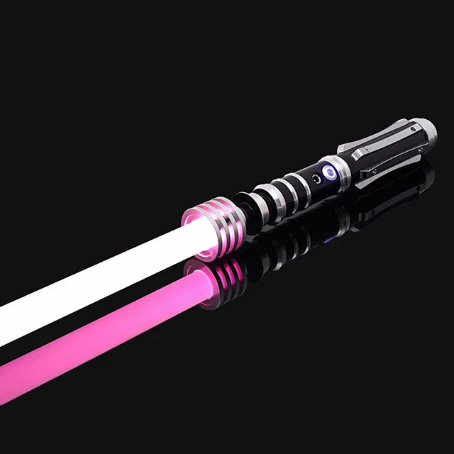 An RGB metal lightsaber with a pink blade and black hilt, shown diagonally against a black background.