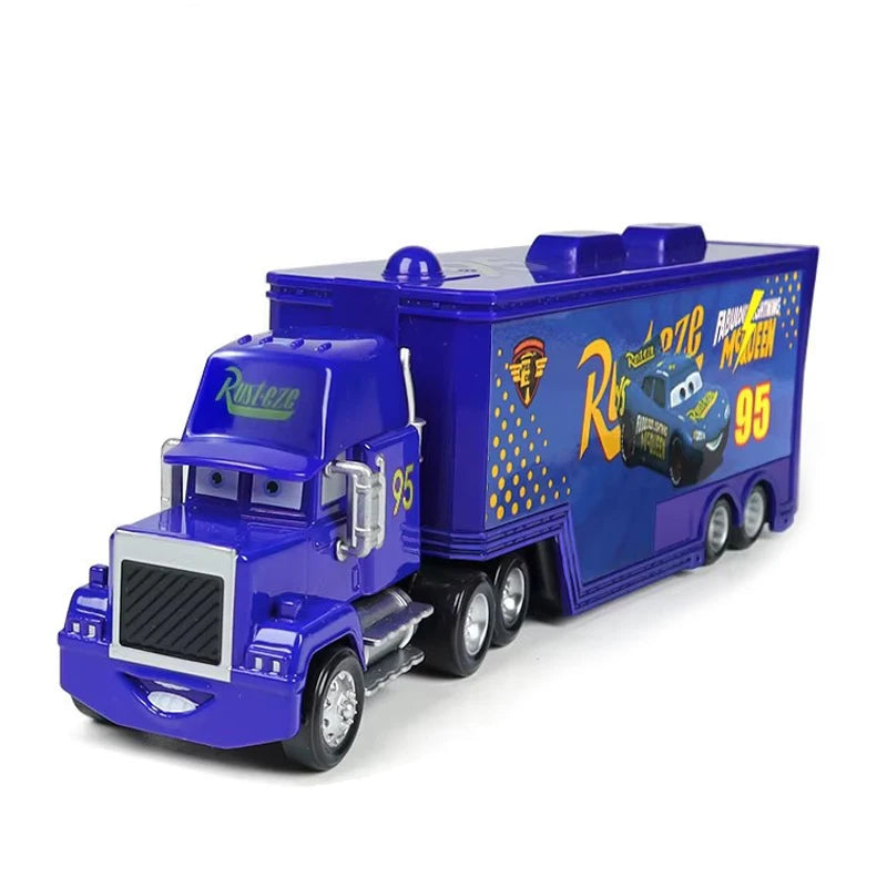 A blue diecast toy hauler truck featuring Lightning McQueen and a racing theme.