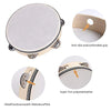 A white tambourine with a light wood rim and metal bells, showing grips and material details.