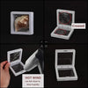 Two white acrylic jewelry storage display boxes showing a creased item and an item to be blown gently with a hair dryer.