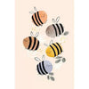 Watercolor painting kit featuring bees and flowers on light beige paper.