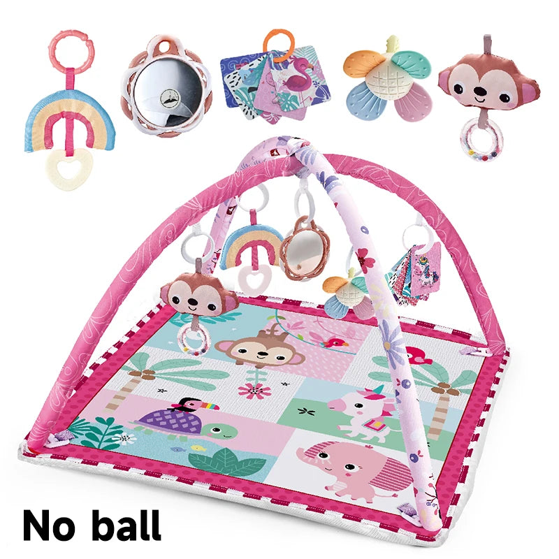 A pink baby play mat with a fitness frame and various hanging toys for baby development.