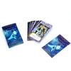 A deck of Spanish Angel Oracle cards featuring purple and gold designs with angelic imagery.
