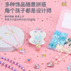 A pink background shows various colorful polymer clay bead jewelry pieces and a kit for children to make jewelry.
