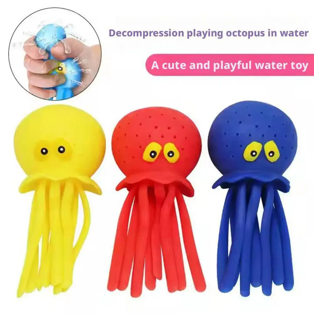 A set of colorful octopus bath toys including yellow, red, and blue squeezable toys for toddlers.