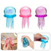 Three squishy jellyfish-shaped sensory fidget toys in blue, pink, and purple colors shown from different angles