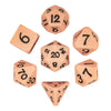 A set of pink silicone polyhedral dice, including a d12, d7, and d30, displayed on a white background.