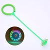 A bright green foldable jump ring attached to a long, slender rod, with the end shaped like a small ball.