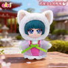 A plush blind box featuring a white cat-like head with blue hair and pink clothing.