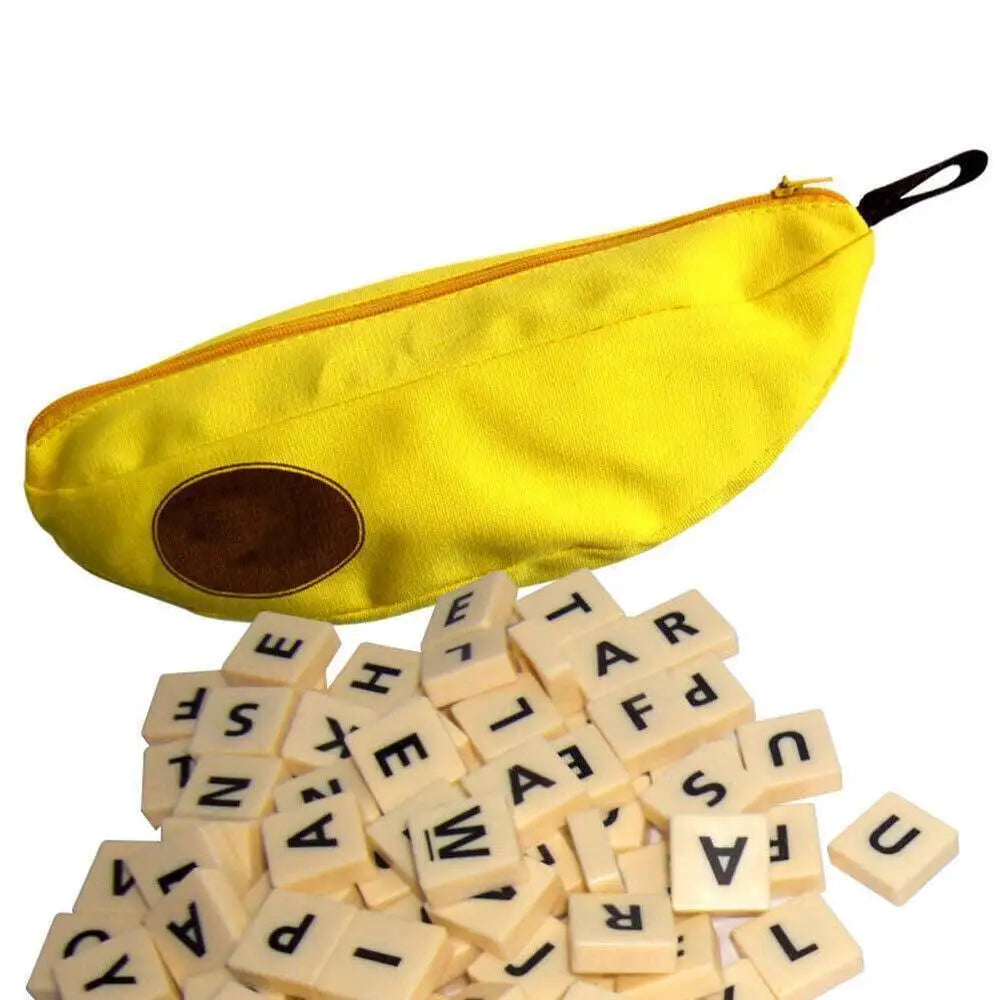 A yellow storage bag shaped like a banana with an avocado design, next to a pile of alphabet letter blocks.