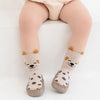 Pair of beige cartoon animal non-slip socks for babies and toddlers