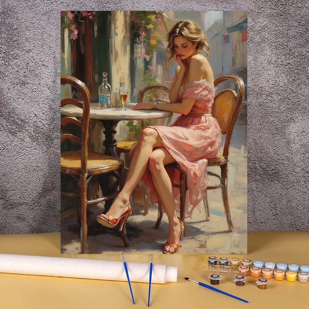 A painting by numbers kit showing an elegant woman portrait in pink dress sitting on a chair.