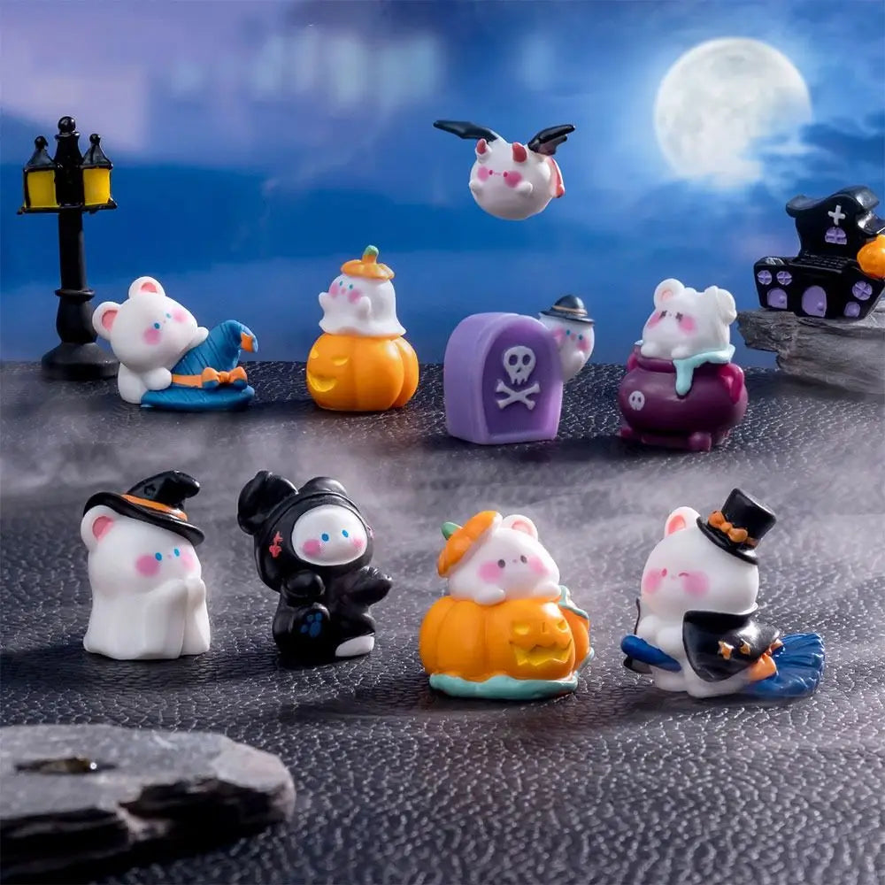 A collection of charming cartoon pumpkin bear figurines in various colors and styles displayed against a blue night sky backg