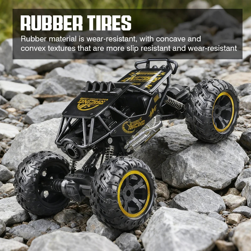 A black rubber tires off-road RC car is positioned on a rocky surface.